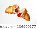 Croissant with stuffing on a white background 136900177