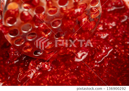 juicy red fresh grated strawberries in a bowl, making a sweet delicious and juicy dessert from natural berries, a large bowl with grated ripe strawberries while making desserts juicy red fresh grated strawberries in a bowl, making a sweet delicious and juicy dessert from natural berries, a large bowl with grated ripe strawberries while making desserts 136900292