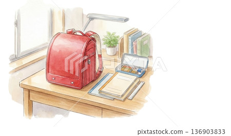 桌上放著一個書包和一套第二天要使用的學習用品。 136903833