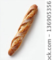 Freshly Baked Crusty French Baguette Isolated on White Background - Artisanal Traditional Bread for Bakery and Culinary Concepts 136905356