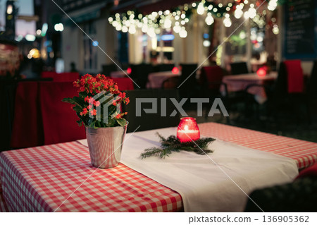 Cozy Table Setting with Candle and Flowers 136905362