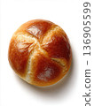 Golden Brown Kaiser Roll Bread Bun Isolated on White Background - Overhead Top View of Single Fresh Crusty Roll for Sandwiches and Breakfast 136905599