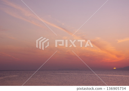 Sunset over the sea 136905734
