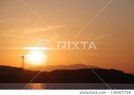 The setting sunset The setting sunset 136905789