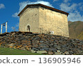 The old Orthodox church of Lamaria and its bell in the village of Ushguli, Georgia. 136905946