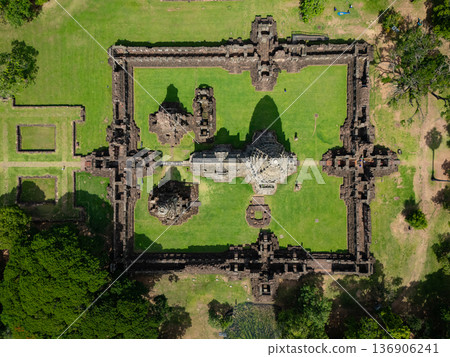 Drone shot the aerial view of Phimai Historical Park. the ancient stone temple Nakhon Ratchasima, Thailand Drone shot the aerial view of Phimai Historical Park. the ancient stone temple Nakhon Ratchasima, Thailand 136906241