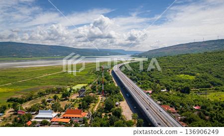 Drone shot The M6 motorway Nakhon Ratchasima Province - Bang Pa-in Lam Ta Khong River and Mountain. Motorway Korat Thailand 136906249