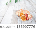 dried fruits on a white plate 136907776