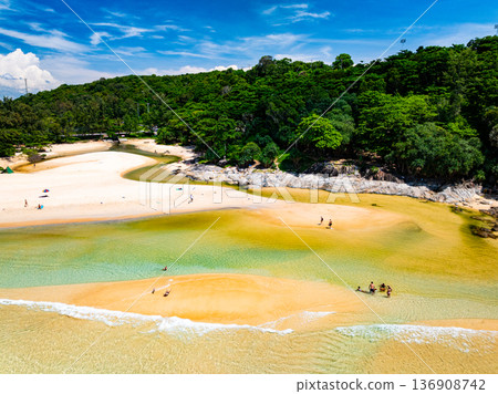Aerial view of a blue sea surface water texture background and sun reflections Aerial flying drone view Waves water surface texture on sunny tropical ocean Aerial view of a blue sea surface water texture background and sun reflections Aerial flying drone view Waves water surface texture on sunny tropical ocean 136908742