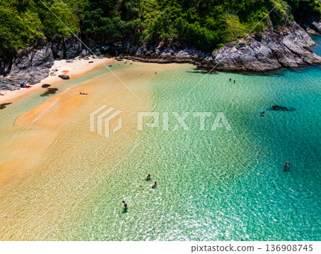 Aerial view of a blue sea surface water texture background and sun reflections Aerial flying drone view Waves water surface texture on sunny tropical ocean Aerial view of a blue sea surface water texture background and sun reflections Aerial flying drone view Waves water surface texture on sunny tropical ocean 136908745