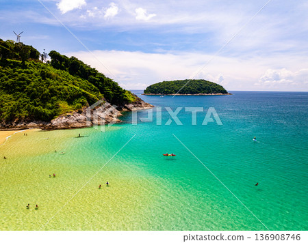 Aerial view of a blue sea surface water texture background and sun reflections Aerial flying drone view Waves water surface texture on sunny tropical ocean Aerial view of a blue sea surface water texture background and sun reflections Aerial flying drone view Waves water surface texture on sunny tropical ocean 136908746