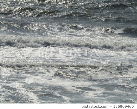 White waves crashing on Kemigawahama Beach as the first spring wind blows White waves crashing on Kemigawahama Beach as the first spring wind blows 136909460