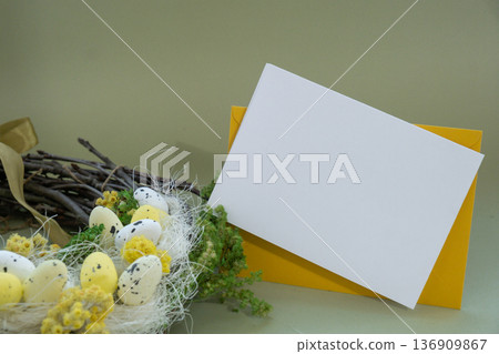 Template mock up of envelope postcard holiday greeting card Handmade Easter wreath made of sustainable materials decorations in yellow color. Homemade decor Easter celebration gift present ideas. Copy Template mock up of envelope postcard holiday greeting card Handmade Easter wreath made of sustainable materials decorations in yellow color. Homemade decor Easter celebration gift present ideas. Copy 136909867