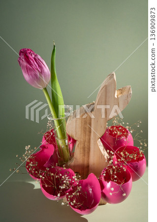 Easter holiday decoration from sustainable materials pink colored egg shell wooden bunny vase decor with fresh tulip flower. Copy space Diy do it yourself Gift present idea. Zero waste Crafting Easter holiday decoration from sustainable materials pink colored egg shell wooden bunny vase decor with fresh tulip flower. Copy space Diy do it yourself Gift present idea. Zero waste Crafting 136909873