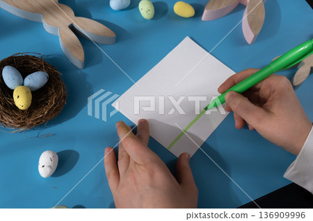 Drawing Easter rabbit bunny Storytelling of creating craft Easter greeting card holiday present. Tactile hand-on activity. Master class progress of creative me-made gifts. Seasonal domestic life micro 136909996