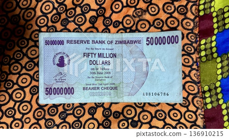 Close-up of Zimbabwe's $50 million banknote, travel and tourism financial concept material Close-up of Zimbabwe's $50 million banknote, travel and tourism financial concept material 136910215