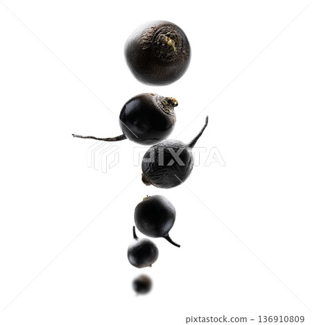 Black turnips levitate on a white background Black turnips levitate on a white background 136910809