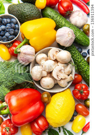 Colorful healthy food variety with fresh fruits and vegetables 136911394