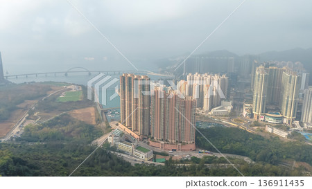 Hazy skyline of Tseung Kwan O overlooking dense highrises Feb 21 2026 Hazy skyline of Tseung Kwan O overlooking dense highrises Feb 21 2026 136911435
