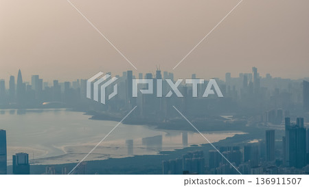 Scenic Houhai Bay coastline beside vibrant modern Shenzhen district Feb 18 2026 Scenic Houhai Bay coastline beside vibrant modern Shenzhen district Feb 18 2026 136911507