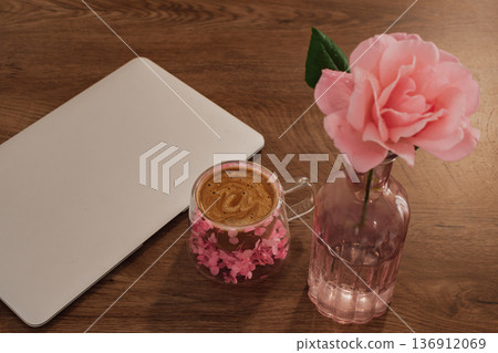 morning work routine: fresh coffee and beautiful rose decorating the start of a digital day morning work routine: fresh coffee and beautiful rose decorating the start of a digital day 136912069