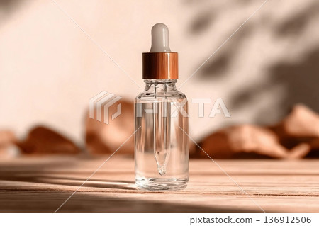 Natural oil cosmetics. Dropper glass Bottle Mock-Up. Oily cosmetic pipette. Face and body treatment. Spa concept. Mineral organic liquid. Front view. Beauty products. Blank packaging on wooden table. Natural oil cosmetics. Dropper glass Bottle Mock-Up. Oily cosmetic pipette. Face and body treatment. Spa concept. Mineral organic liquid. Front view. Beauty products. Blank packaging on wooden table. 136912506