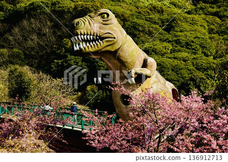 Giant dinosaurs and Kawazu cherry blossoms on Kasado Island Giant dinosaurs and Kawazu cherry blossoms on Kasado Island 136912713