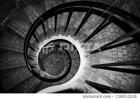 The structural beauty of a monochrome spiral staircase The structural beauty of a monochrome spiral staircase 136912816