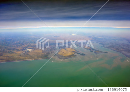 Rio Negro Submerged bay bahia anegada peninsula valdes aerial view panorama from airplane window Rio Negro Submerged bay bahia anegada peninsula valdes aerial view panorama from airplane window 136914075