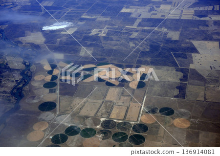 Agriculture circular irrigation circles aerial view in peninsula valdes panorama from airplane window Agriculture circular irrigation circles aerial view in peninsula valdes panorama from airplane window 136914081