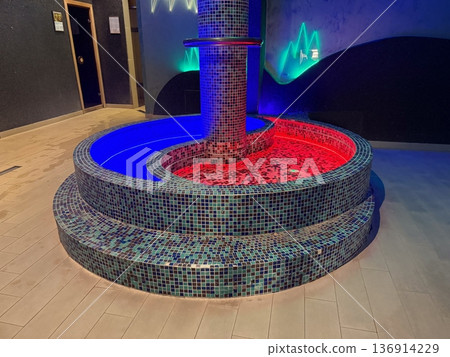 Illuminated kneipp pool with mosaic tiles and contrasting water zones. Hydrotherapy ritual, circulation stimulation and modern wellness interior 136914229
