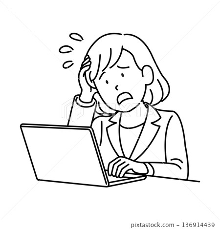 A woman holding her head in front of a personal computer 136914439