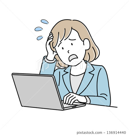 A woman holding her head in front of a personal computer 136914440