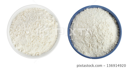 White flour in ceramic bowl isolated on white background. Top view. Flat lay. White flour in ceramic bowl isolated on white background. Top view. Flat lay. 136914920