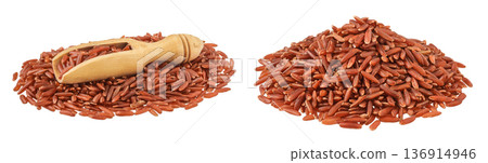 red rice in a wooden scoop isolated on white background 136914946