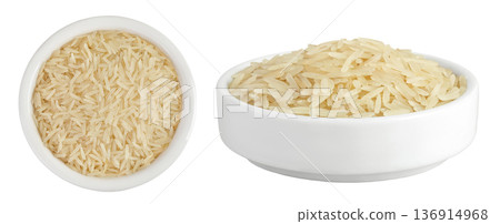 rice basmati in a ceramic bowl isolated on white background. Top view. Flat lay rice basmati in a ceramic bowl isolated on white background. Top view. Flat lay 136914968