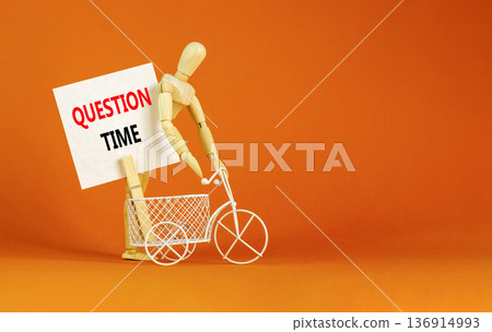 Question time symbol. Concept words Question time on beautiful white paper on wooden clothespin. Bicycle. Beautiful orange background. Business and question time concept. Copy space. Question time symbol. Concept words Question time on beautiful white paper on wooden clothespin. Bicycle. Beautiful orange background. Business and question time concept. Copy space. 136914993
