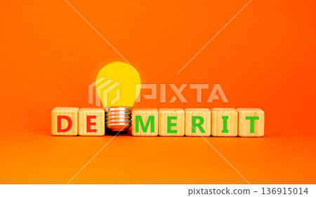 Demerit symbol. Concept word Demerit on beautiful wooden blocks. Beautiful orange background. Beautiful yellow light bulb. Business demerit concept. Copy space. Demerit symbol. Concept word Demerit on beautiful wooden blocks. Beautiful orange background. Beautiful yellow light bulb. Business demerit concept. Copy space. 136915014