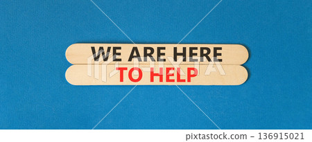 Support, help and we are here to help symbol. Concept words We are here to help on beautiful wooden sticks. Beautiful blue background. Business we are here to help concept. Copy space. Support, help and we are here to help symbol. Concept words We are here to help on beautiful wooden sticks. Beautiful blue background. Business we are here to help concept. Copy space. 136915021