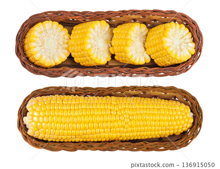 ear of corn in a wicker basket isolated on a white background. Top view. Flat lay 136915050