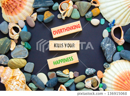 Overthinking kills your happiness symbol. Concept words Overthinking kills your happiness on wooden blocks. Beautiful black background. Business overthinking kills happiness concept. Copy space. 136915068