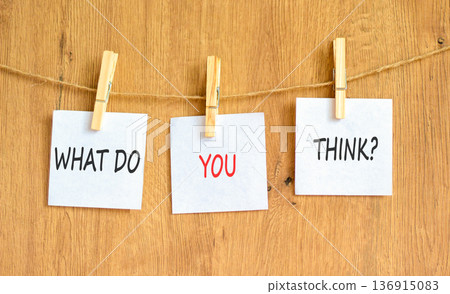 Support, help what do you think symbol. Concept words What do you think on beautiful white papers on wooden clothespin. Beautiful wooden background. Business what do you think concept. Copy space. Support, help what do you think symbol. Concept words What do you think on beautiful white papers on wooden clothespin. Beautiful wooden background. Business what do you think concept. Copy space. 136915083