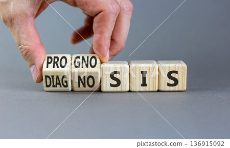 Prognosis or diagnosis symbol. Concept words Prognosis or Diagnosis on beautiful wooden blocks. Beautiful grey background. Doctor's hand. Business prognosis or diagnosis concept. Copy space. Prognosis or diagnosis symbol. Concept words Prognosis or Diagnosis on beautiful wooden blocks. Beautiful grey background. Doctor's hand. Business prognosis or diagnosis concept. Copy space. 136915092