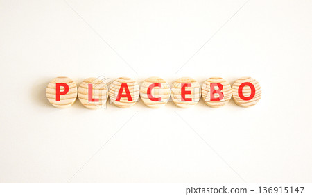 Placebo word medical symbol. Concept word Placebo on beautiful wooden circles. Beautiful white background. Business placebo word medical concept. Copy space. 136915147