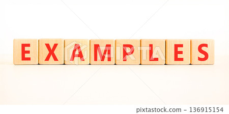 Example examples word symbol. Concept word Examples on beautiful wooden blocks. Beautiful white background. Business example examples word concept. Copy space. Example examples word symbol. Concept word Examples on beautiful wooden blocks. Beautiful white background. Business example examples word concept. Copy space. 136915154