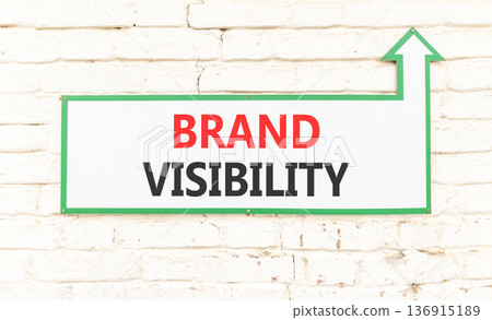 Brand visibility symbol. Concept words Brand visibility on beautiful big white sign plate. Beautiful old white stone wall background. Business branding and brand visibility concept. Copy space. 136915189