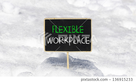 Flexible workplace symbol. Concept words Flexible workplace on beautiful yellow blackboard. Beautiful white snow background. Business Flexible workplace concept. Copy space. Flexible workplace symbol. Concept words Flexible workplace on beautiful yellow blackboard. Beautiful white snow background. Business Flexible workplace concept. Copy space. 136915233