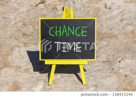 Chance time symbol. Concept word Chance time on beautiful black blackboard. Beautiful stone background. Black blackboard. Business chance time concept. Copy space. 136915240