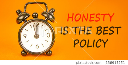 Honesty is the best policy symbol. Concept words Honesty is the best policy on beautiful orange paper. Beautiful orange background. Alarm clock. Business honesty is the best policy concept. Copy space Honesty is the best policy symbol. Concept words Honesty is the best policy on beautiful orange paper. Beautiful orange background. Alarm clock. Business honesty is the best policy concept. Copy space 136915251