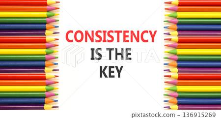 Consistency is the key symbol. Concept words Consistency is the key on beautiful white paper. Beautiful white background. Colored pencils. Business consistency is the key concept. Copy space. Consistency is the key symbol. Concept words Consistency is the key on beautiful white paper. Beautiful white background. Colored pencils. Business consistency is the key concept. Copy space. 136915269